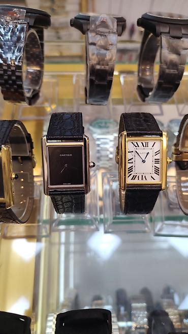 smar saat: Cartier Tank seriyası qol saatları - Korpus: düzbucaqlı forma, qızılı — 5