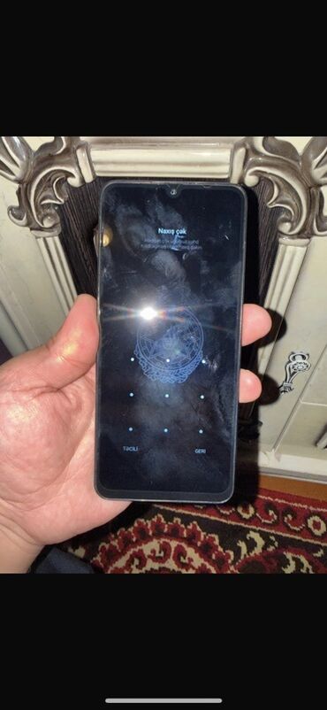 samsunq not 3: Redmi smartfon - Arxa tərəf: dairəvi kamera adası, 50MP əsas kamera