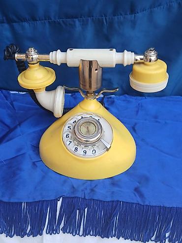 dekorativ nomrə: Retro masa telefon aparatı – sarı korpuslu, mexaniki fırlanan nömrə — 1
