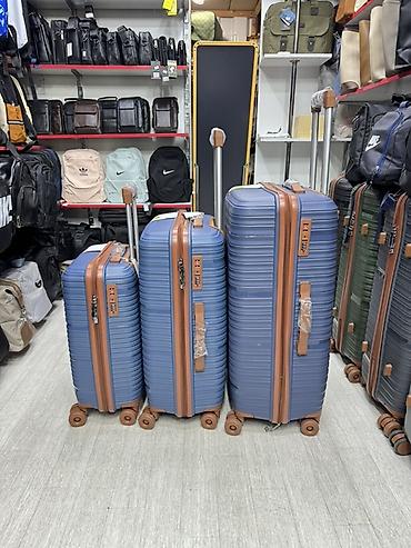 купить чемодан: Чемодан, Новый, Материал: Пластик, Средний (40 - 70 л), Вращающиеся колеса на 360° — 6