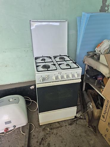 indesit: Газовая плита Indesit с духовкой - 4 газовые конфорки разного — 1