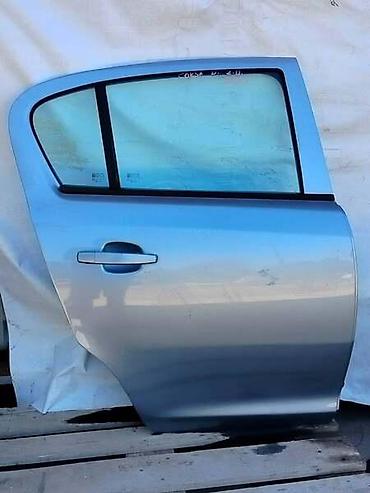 auto otpad vrsac: ZADNJA DESNA VRATA ZA OPEL CORSA D OD 2006. DO 2014. GOD. | Zadnja — 1