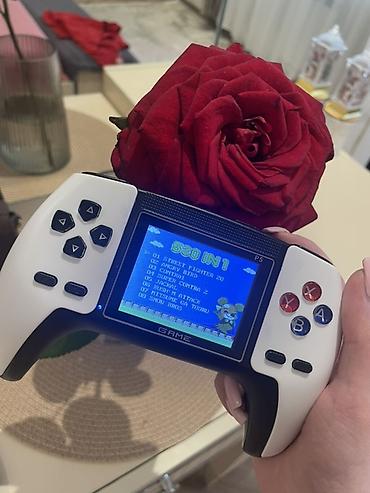 retroid pocket 5: Portativ retro oyun konsolu – “GAME P5” tipli - Üzərində daxili — 2