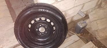 zapas teker: 195/65/15 lçülü, qara rəngli avtomobil təkəri polad disklə birlikdə — 1