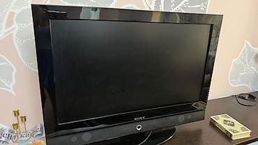 sony bravia: Телевизор Sony Bravia (серия с логотипом внизу по центру и динамиками — 1