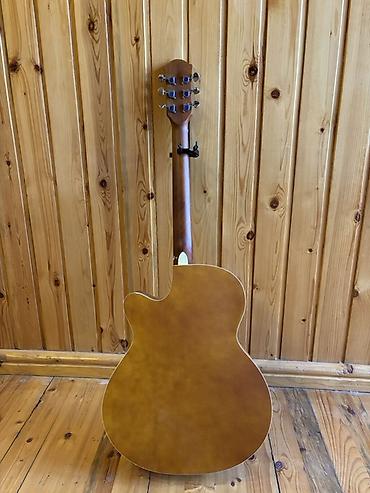 gitara usaq ucun: Akustik gitara – cutaway korpuslu, 6 simli - Korpus: jumbo/Grand — 3