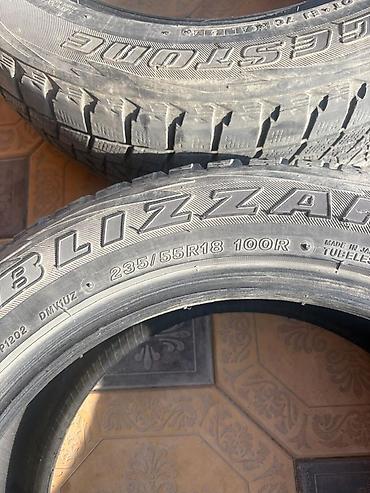 купить литые диски на авто: Комплект из 4 зимних шин Bridgestone Blizzak. - Размер: 235/55 R18 - — 2