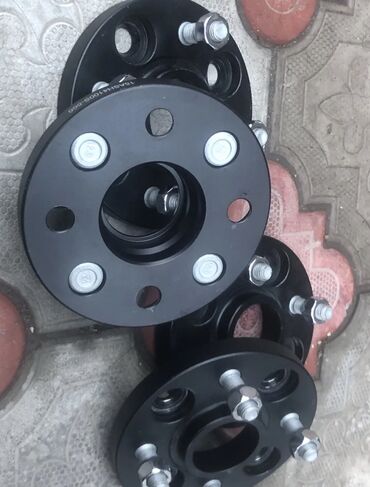 corolla runx: Проставки 4x100 толщина 1,5 см, центральное отверстие 56.6 см. гайки в