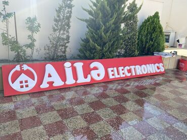 Avtoservis avadanlıqları: Ailə Electronics şirkəti üçün nəzərdə tutulmuş bu reklam lövhəsi