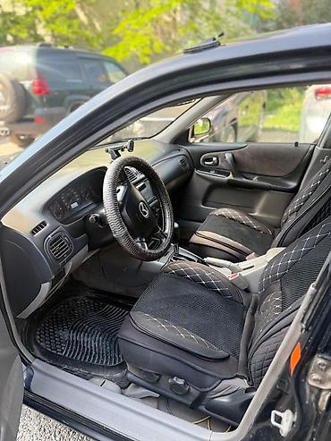 mazda mx5: Mazda 323: 2002 г., 1.5 л, Автомат, Бензин, Седан — 3