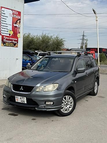 руль митсубиси: Mitsubishi Airtrek: 2001 г., Автомат, Бензин, Универсал — 2