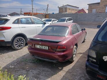 Mazda: Mazda 6: 1995 г., 0.7 л, Механика, Бензин, Седан