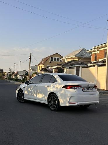 byd e2: Toyota Corolla: 2022 г., 1.8 л, Автомат, Гибрид, Седан — 3