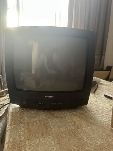 телефон fly mc100 блок питания: Philips CRT televizor - Korpus: Kompakt, stolüstü dizayn, qara rəng -