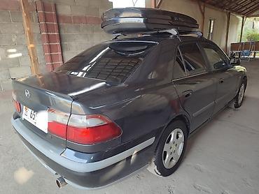 мотор майы: Mazda 626: 1999 г., 1.8 л, Кол менен иштөөчү, Бензин, Седан — 4