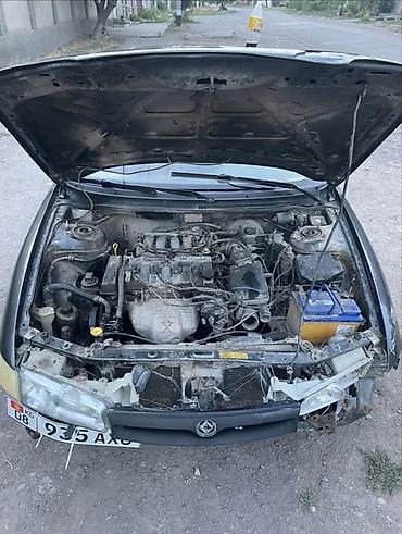 malibu 2 turbo: Mazda 626: 1994 г., 2 л, Механика, Бензин, Седан — 7