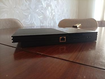 ps2 pultu: PlayStation 2 Slim (PS2) oyun konsolu – “Белочка” kompaniyasının — 7