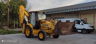 işlənmiş disklər: Komatsu markalı bu ekskavator-yükləyici tikinti və ağır işlər üçün