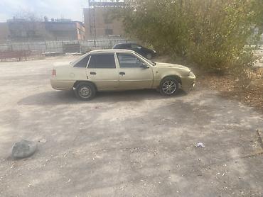 Daewoo Nexia: 2012 г., 1.6 л, Механика, Бензин, Седан