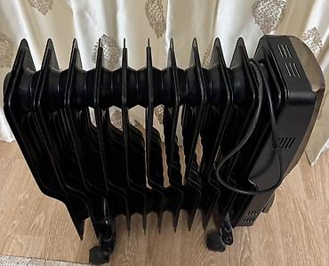 delonghi radia s: Yağlı radiator tipli elektrikli qızdırıcı - Rəng: qara, metalik ön — 2