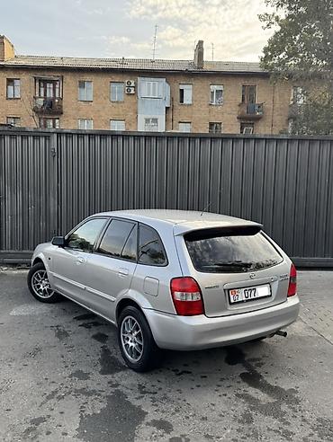 rexton j4: Mazda Familia: 2002 г., 1.6 л, Механика, Бензин, Хэтчбэк — 2
