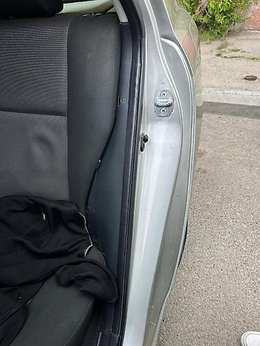 Toyota: Toyota Corolla hatchback (E120), gümüşü rəng. - Kuzov: 5 qapılı — 18