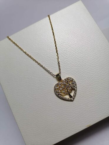 Ogrlice: Nakit, hiruški čelik
Cena 1100din — 13