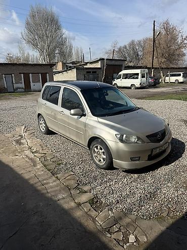боковой тырмоо: Mazda Demio: 2003 г., 1.5 л, Автомат, Бензин, Хэтчбэк — 2