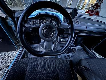 VAZ (LADA): VAZ 2106, mavi rəngli sedan Xüsusiyyətlər: - Kuzov: klassik “şeşorka” — 9