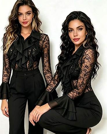 elastin poliamid: Ženska elegantna čipkana bluza sa volanima

Kosulja: 2.700 dinara — 4