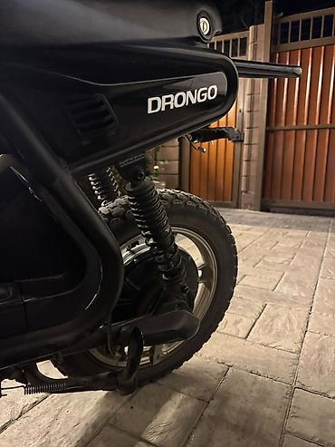 Скутеры: Электроскутер DRONGO - Компактный городской электроскутер с высоким — 6