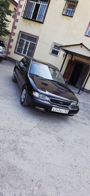 Kia: Kia Clarus: 1998 г., 2 л, Механика, Газ, Седан
