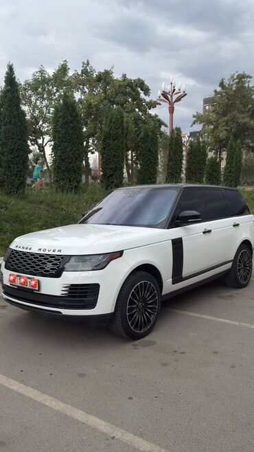 опель внедорожник: Автомобиль Land Rover Range Rover белого цвета с черной крышей и