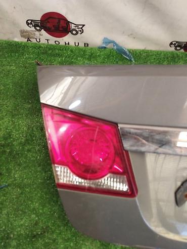 ktopi led: Фонарь крышки багажника Chevrolet Cruze J300 2010 лев. (б/у) — 1