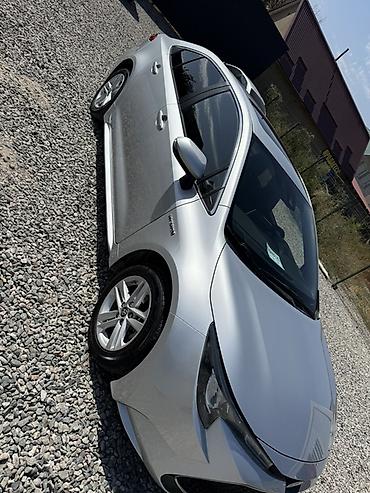 ниже: Toyota Corolla: 2020 г., 1.8 л, Автомат, Гибрид, Седан — 1