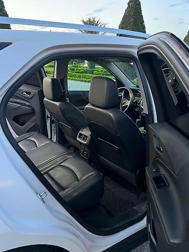 şevralet equinox: Chevrolet Equinox – ağ rəngli, şəhər və uzun yol üçün rahat krossover — 9