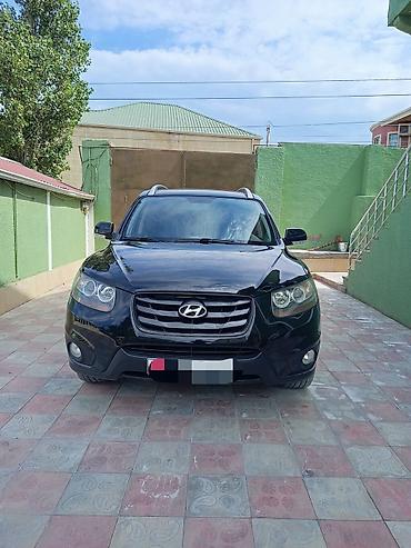 opel duman: Hyundai Santa Fe: 2 l | 2010 il Krossover — 3