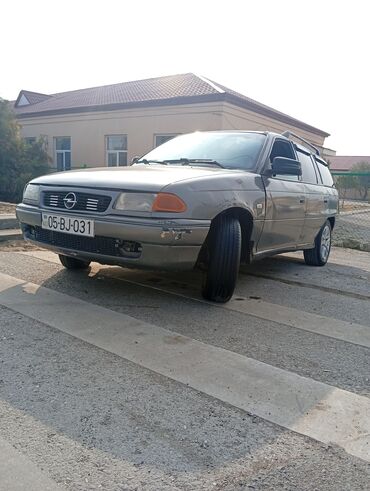 Opel: Opel Astra Caravan (şunur kuzov) Xüsusiyyətlər: - Kuzov — 9