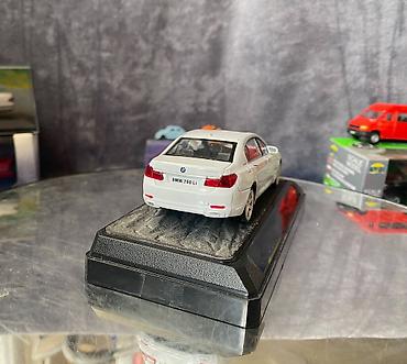 Avtomobil modelləri: Коллекционная модель BMW 750i F02 white 2008 RASTAR Scale 1:43 Art — 13