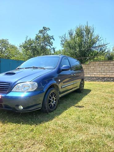 Kia: Kia Carnival: 2.9 l | 2002 il Van/Minivan — 10