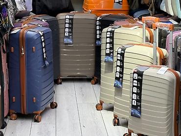 Чемоданы: Чемодан, Новый, Большой (более 70 л), Вращающиеся колеса на 360°, Кодовый замок, На колесах — 7