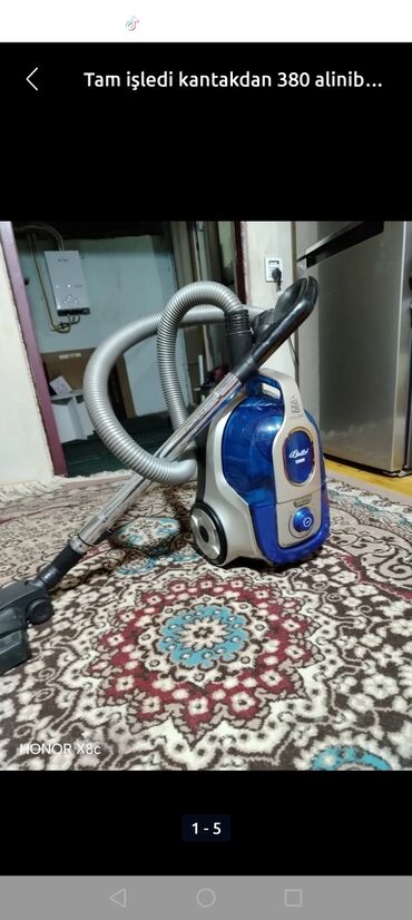 pilite: Rotel markalı, mavi və gümüşü rənglərdə silindrik tozsoran. Şəffaf toz