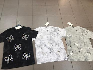 Majice kratkih rukava: Majice 
S M L 
Cena 2000 din — 14