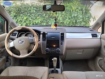 vectra stop: Nissan Tiida – hetçbek - Kuzov: 5 qapılı hetçbek, qızılı rəng - — 6