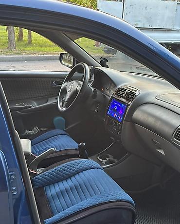byd atto 8: Mazda Capella: 2000 г., 1.8 л, Механика, Бензин, Хэтчбэк — 7