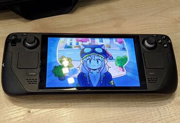 купить игровой руль дешево: Steam deck LCD 512 gb + 256 gb CD card. в комплекте подставка -