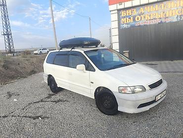 справа: Honda Odyssey: 1998 г., 2.3 л, Автомат, Газ, Минивэн — 5