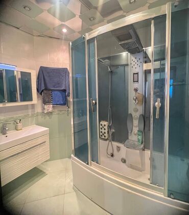 Uzunmüddətli kirayə mənzillər: 9-mikrorayonda Tərlan Şadlıq sarayının yanında 20 mərtəbəli binanın — 13