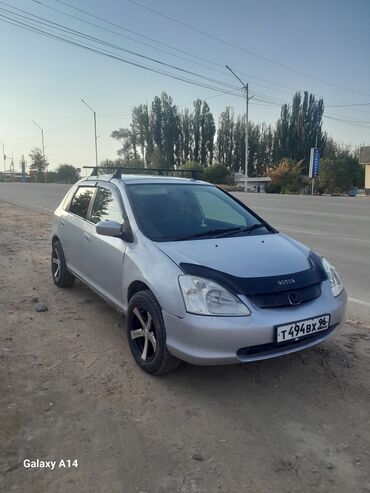 диски на опель зафира а: Хэтчбек Honda Civic серебристого цвета, оснащенный багажником на крыше