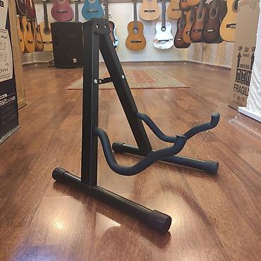 tuner: 1 gitara üçün dayaq Ünvan:Nizami 42 (Daxili işlər nazirliyin arxası) — 2